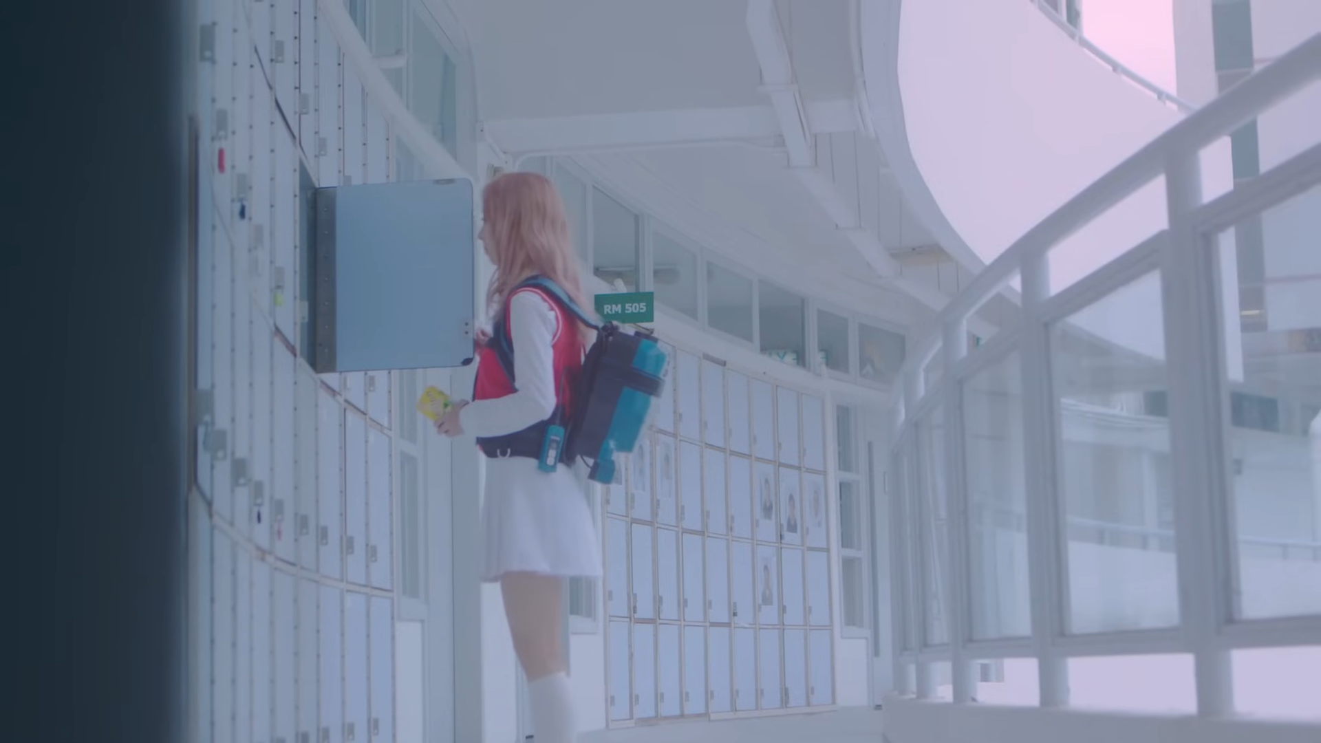 Vivi opening her locker.